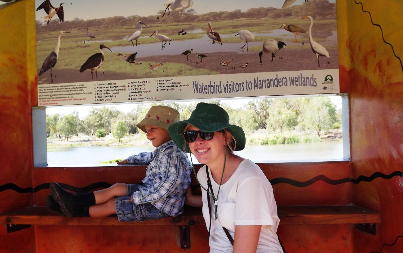 People in bird watching hut